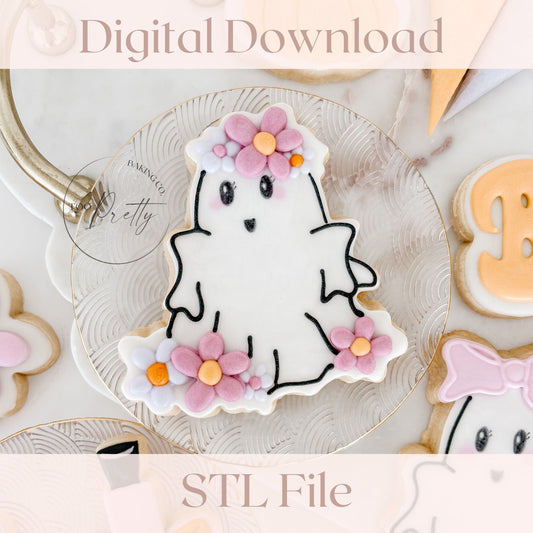 Decorative cookie with a ghost design and floral elements on a plate, with 'Digital Download' text at the top.